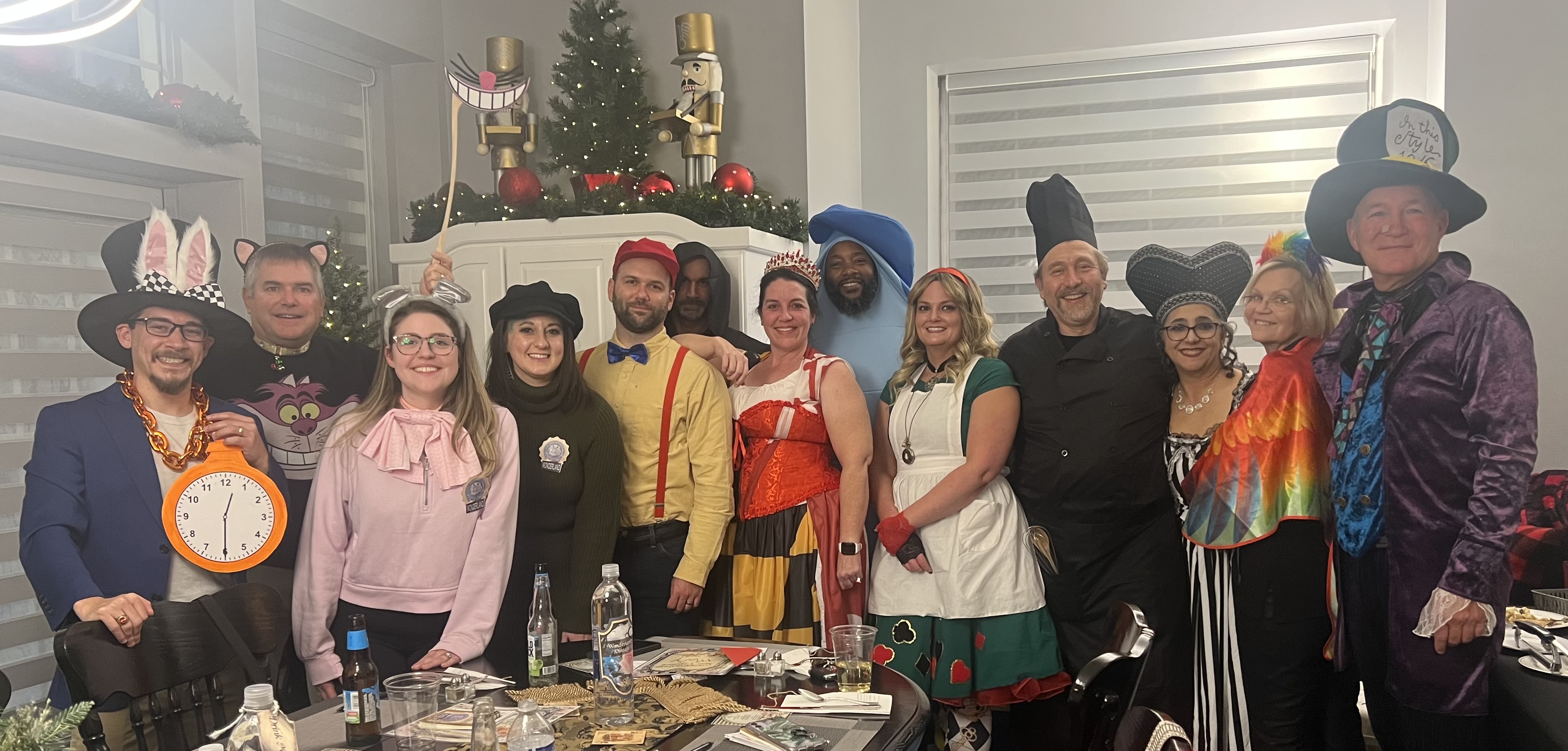 group of 20 adults dressed as characters from Alice in Wonderland