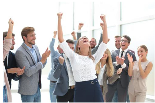Business co-workers celebrating a goal accomplished